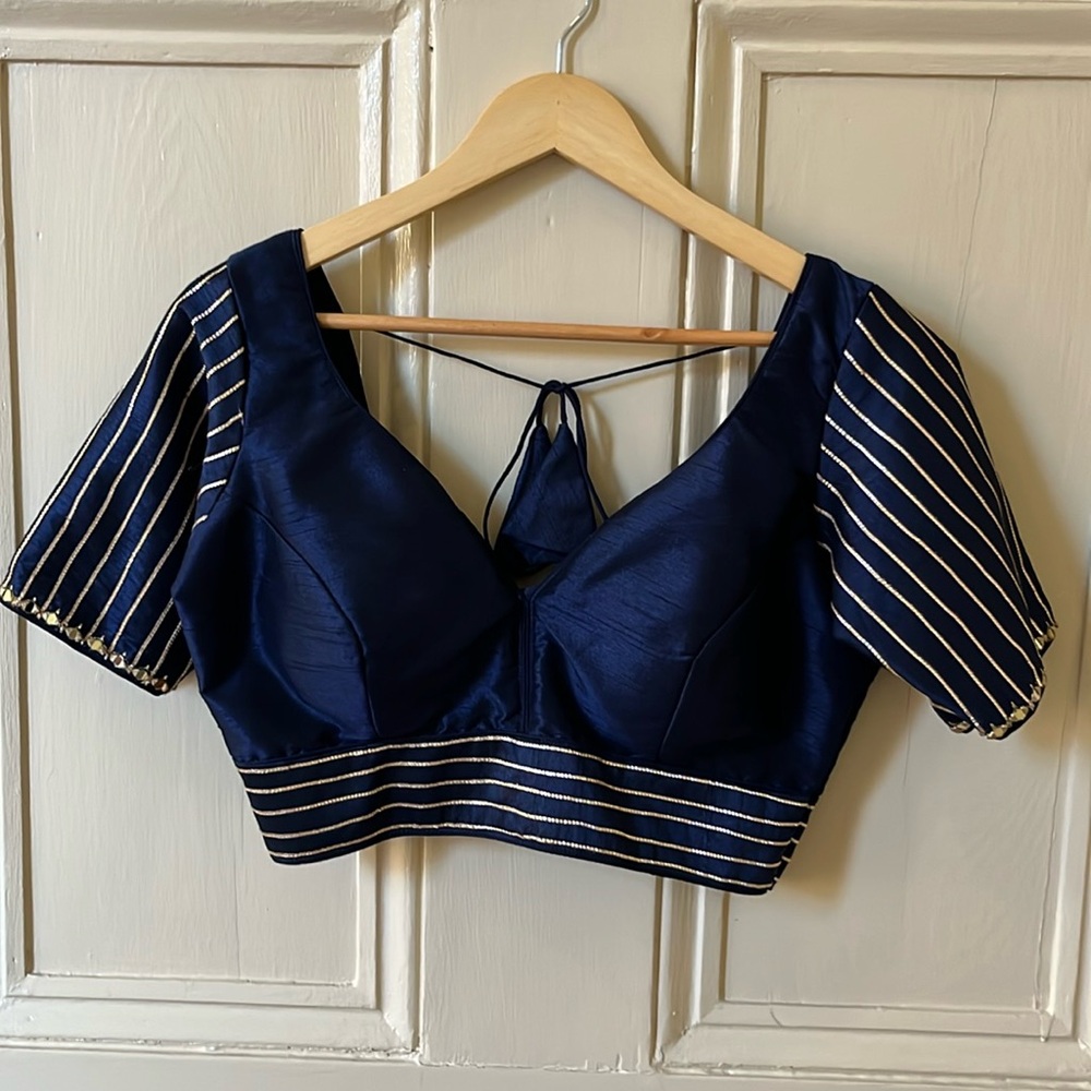 Royal blue Indian saree blouse with gold accents